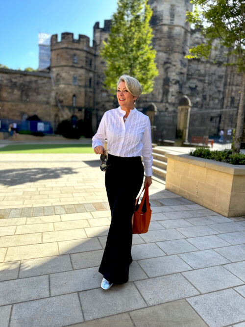 Nikki Garnett wearing the Boden white cotton blouse with mandarin collar