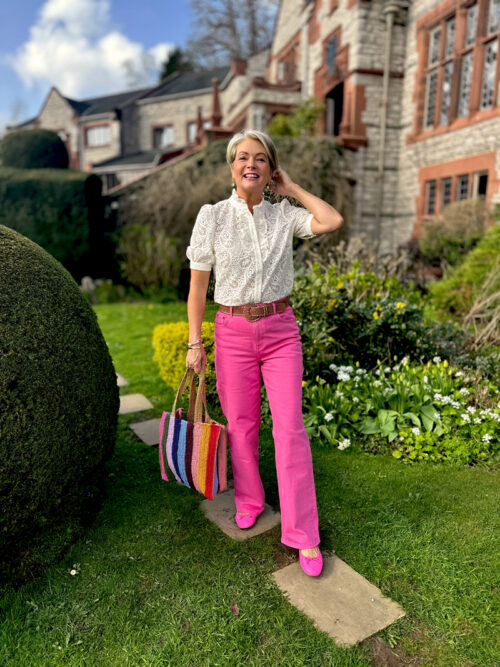 Nikki Garnett wearing the Boden hot pink high-rise column leg trousers